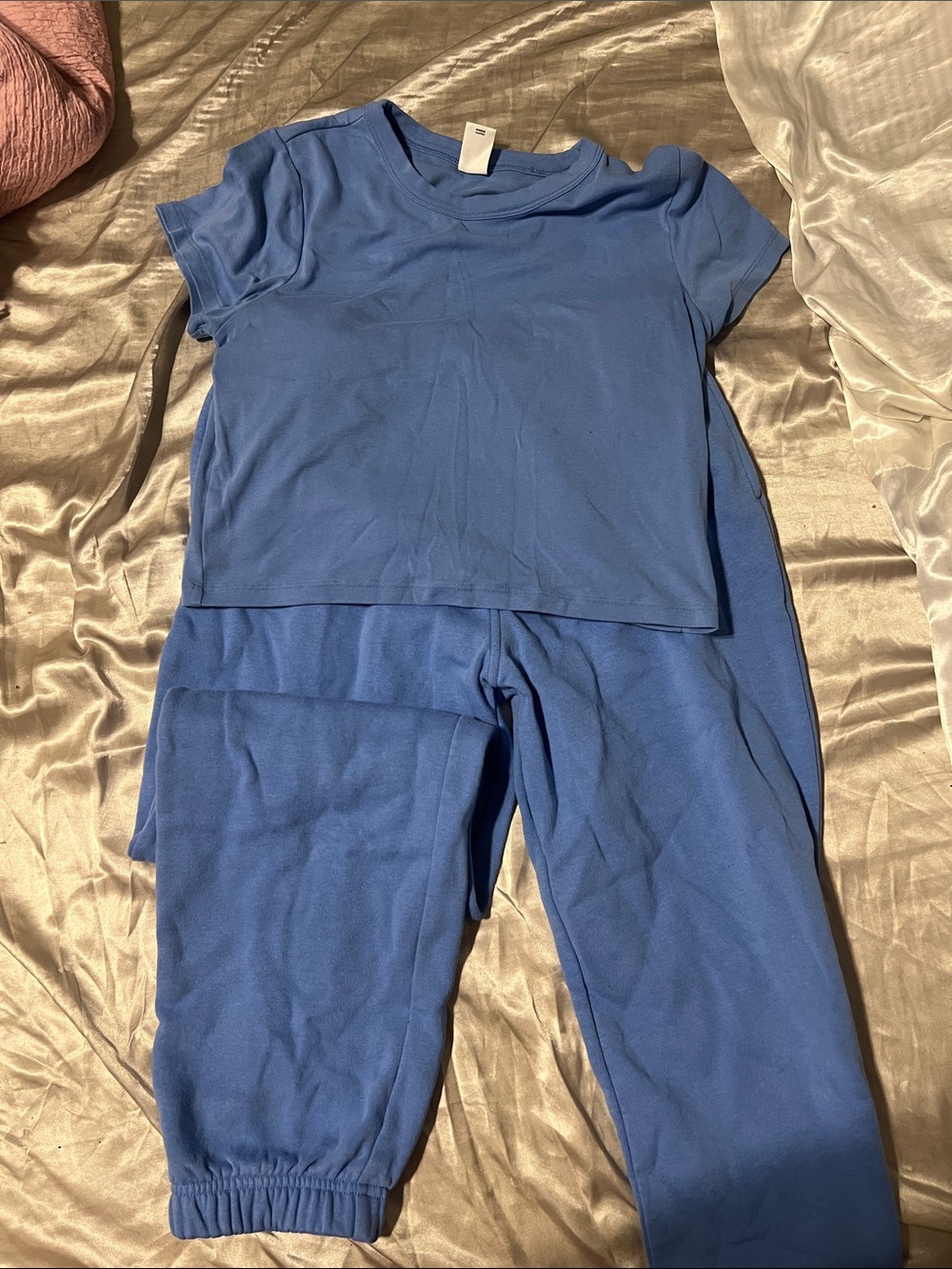 Woman’s blue sweat seat with matching crop top